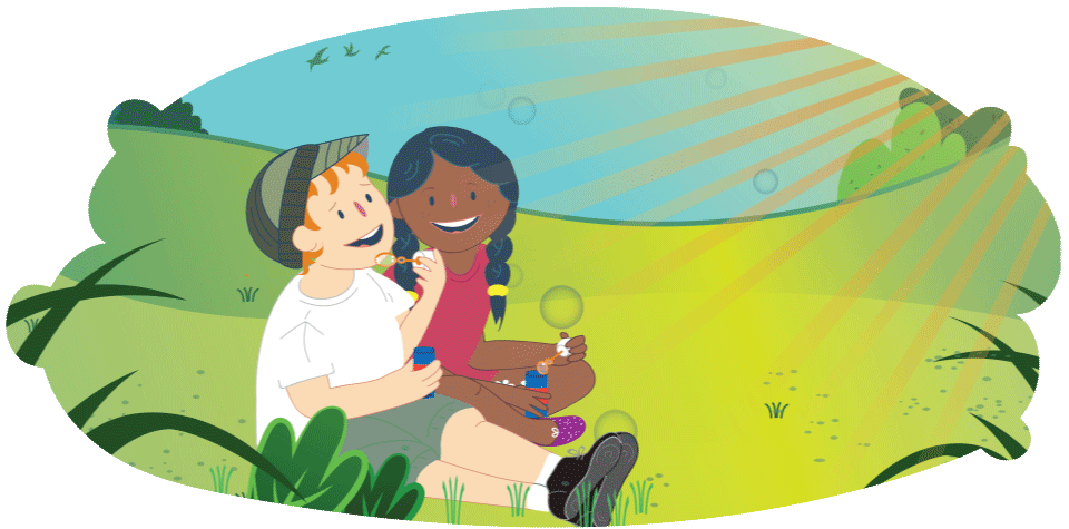 Two kids sitting in grass blowing bubbles