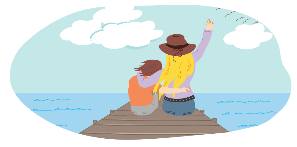 Girl and parent sitting together on pier