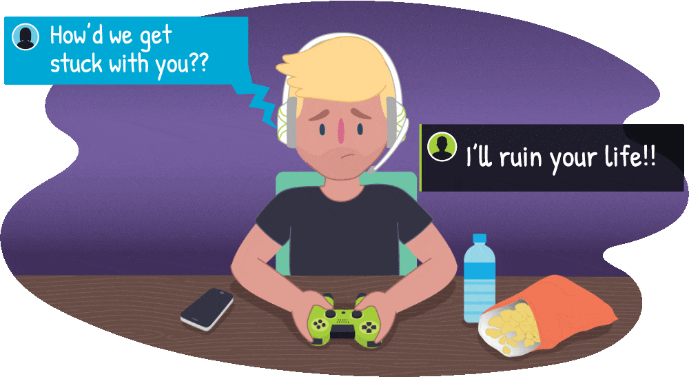 Young male playing online games with cyberbullying in speech bubbles appearing around him